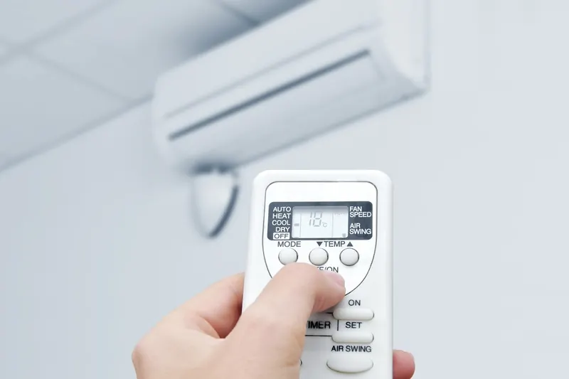 Remote control set to an aircon's heat and cool modes